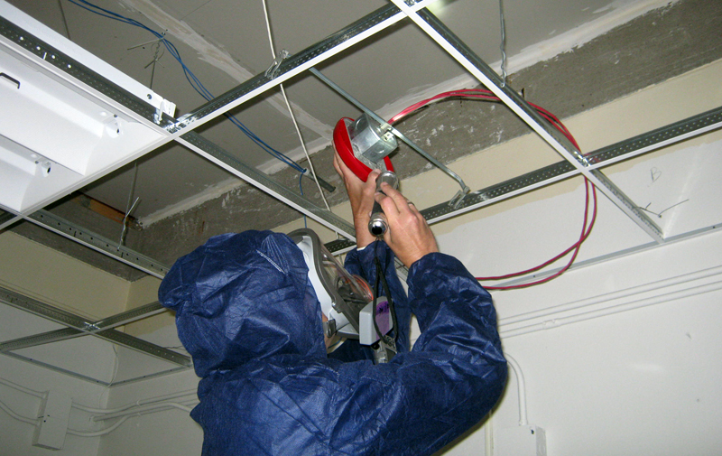 Image of Technician performing air quality testing
