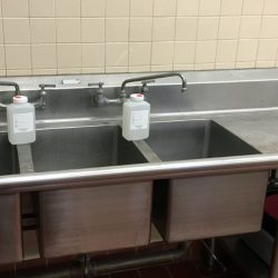 Image of sink and water sampling container